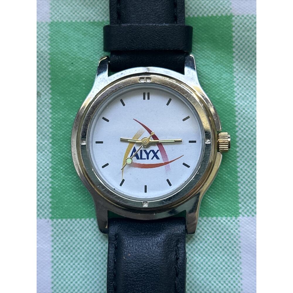 Alyx Silver Tone Black Leather Band Women’s Quartz Watch
